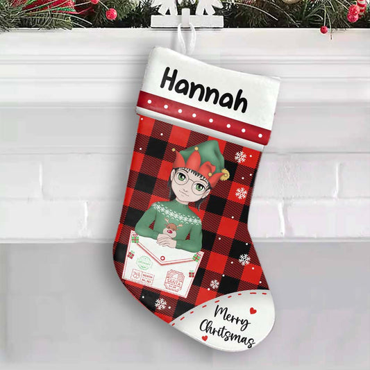 ersonalized children's Christmas stocking in red and green with embroidered name