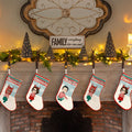 Image of Personalized Christmas Stockings 2023, Close-up of custom name on Christmas Stocking 2023, Personalized Christmas Stockings for Your Family hanging by the fireplace.